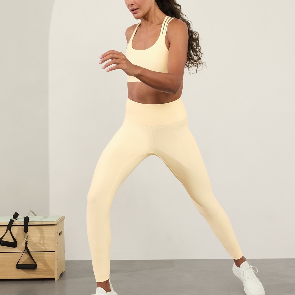 Athleta Light Yellow Glow Interval Stash 7/8 Tight Legging